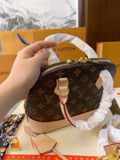 LV Alma Old Flower Shell Bag - Image 3